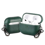 Forest green metal keychain AirPods case with lid open and white earbuds inside