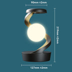 Compact RGB wireless charging lamp with glowing yellow orb and silver light ribbon stem