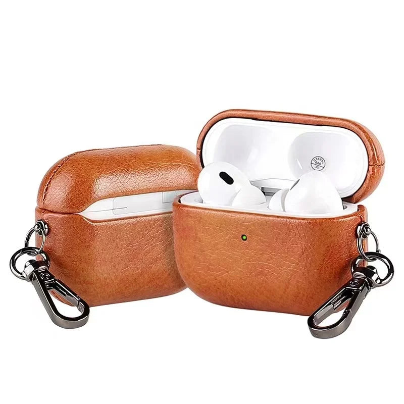 Metal keychain AirPods case in cognac brown leather with AirPods inside