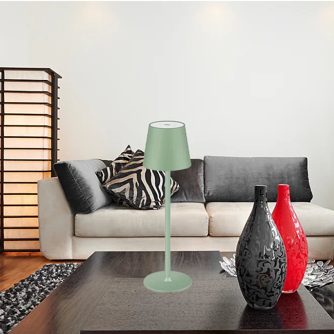 Wireless touch table lamp with mint green shade and matching round base on a coffee table