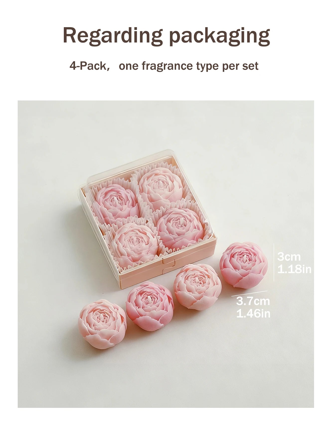 4-pack of pink rose wax candles in a wooden gift box, with several loose candles