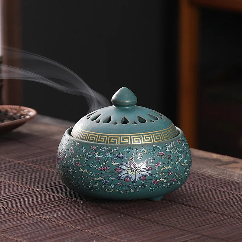 Light sky blue enamel lotus incense burner with perforated lid and floral design