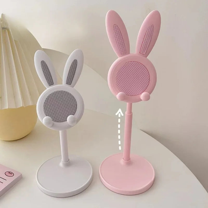 Rabbit phone stands in blush pink and pearl white with mesh ear panels and round bases