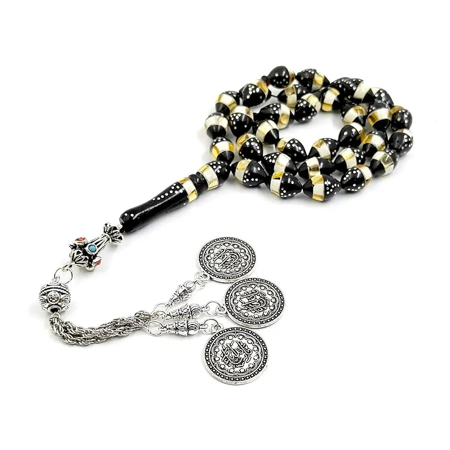 Black and gold prayer beads tasbih with silver medallion charms and small blue bead detail