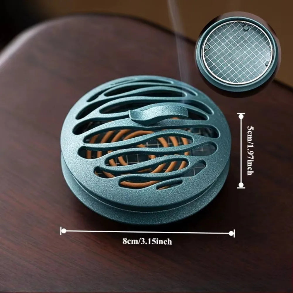 Blue zinc alloy incense burner, round vented design with smoke