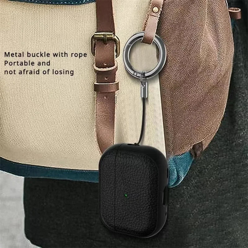 Black leather AirPods keyring case with rope-style strap and metal buckle on bag