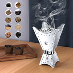 Electric oud incense burner, silver metal with smoke, on wooden surface