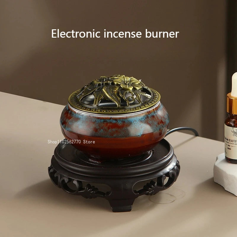 Ceramic electric incense warmer with ornate gold top and multicolor ceramic bowl base