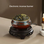 Ceramic electric incense warmer with ornate gold top and multicolor ceramic bowl base