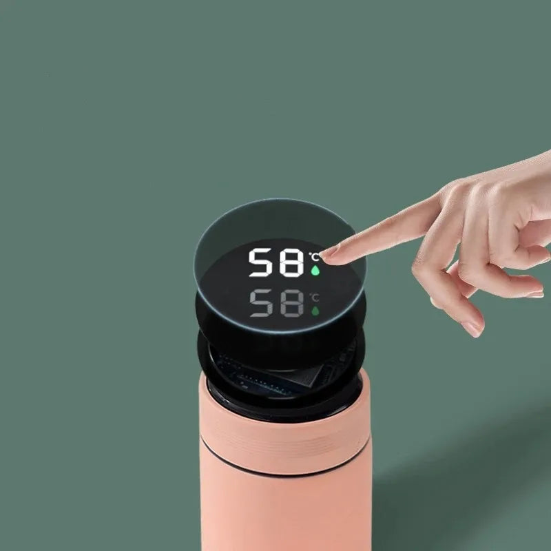 Peach insulated thermos with black lid and digital temperature display on top