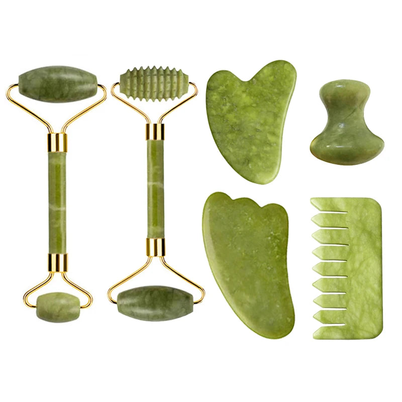 Green jade face roller set with gold handles, plus flat gua sha and comb-style scraper
