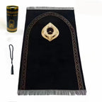 Dark prayer rug with arched mihrab ornament, gold details, and silver fringe border