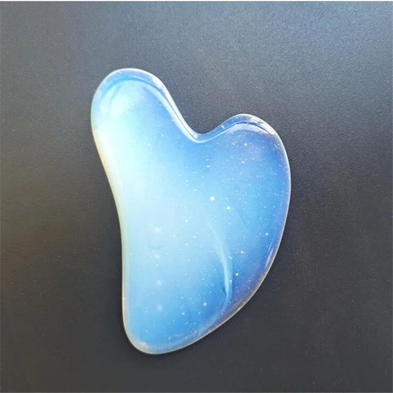 Glow Roller, blau schimmernde Herzform aus Stein, gebogene Polierkante