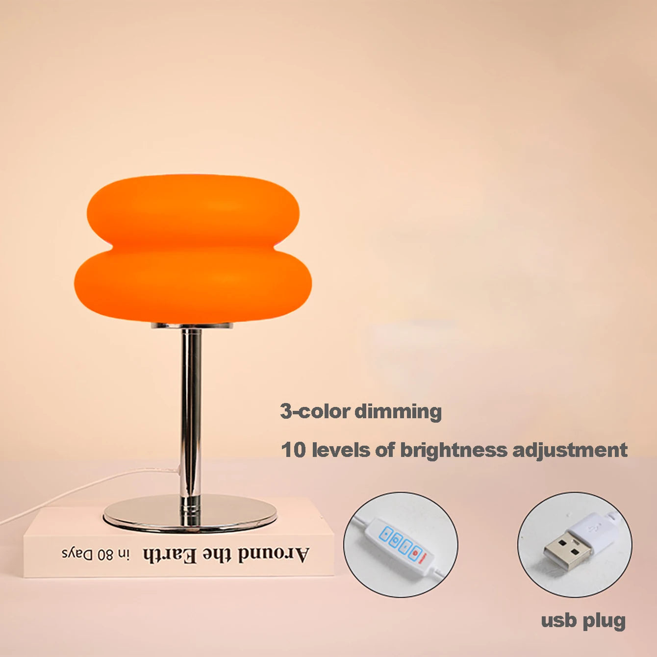 Orange mushroom-shaped USB table lamp with chrome stand and round base