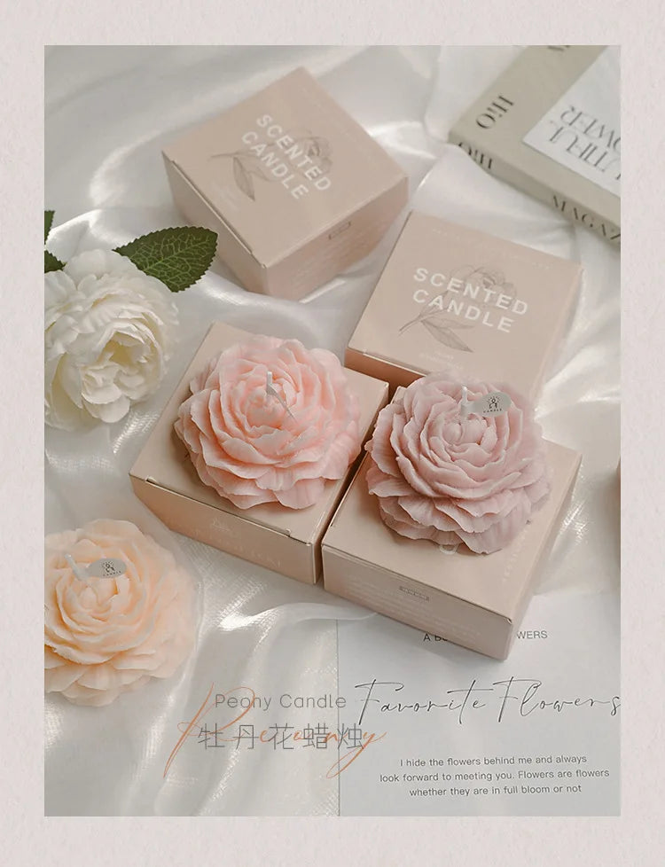 Peach and pink peony sculptural candles in gift boxes with flower shapes