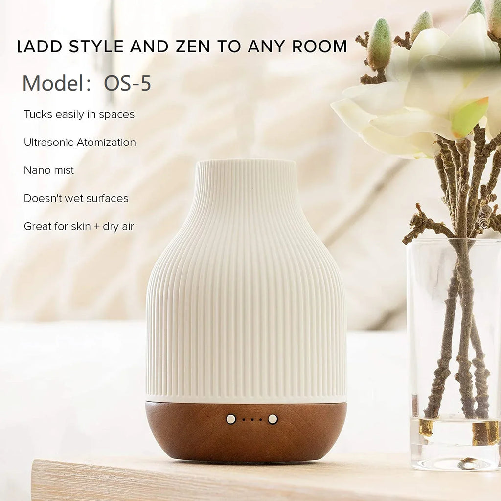 White ribbed ceramic aroma diffuser with brown wood base and front control dots