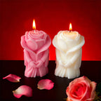 Lit rose-shaped candles in pink and white with rose details and flames