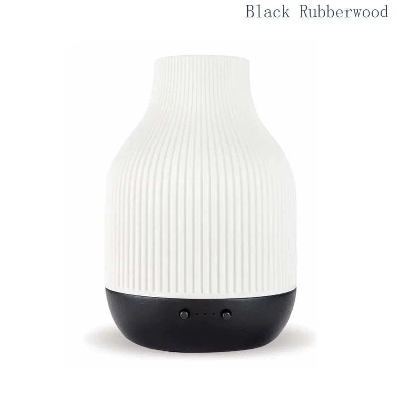 Black Rubberwood aroma diffuser: white ribbed ceramic top, black base with control holes