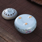 Sky blue enamel lotus incense burner with perforated lid and decorative top knobs
