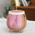 Ultrasonic aroma diffuser humidifier with wood-grain body, multicolor glow, mist rising