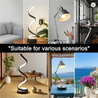 Spiral LED lamp with black base and curved glowing strip, angled for desk use
