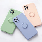 Silicone MagSafe phone cases in peach, green, and light blue, with circular MagSafe rings