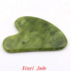 Xinyi Jade beauty scraper, green heart-shaped stone with smooth curved edge