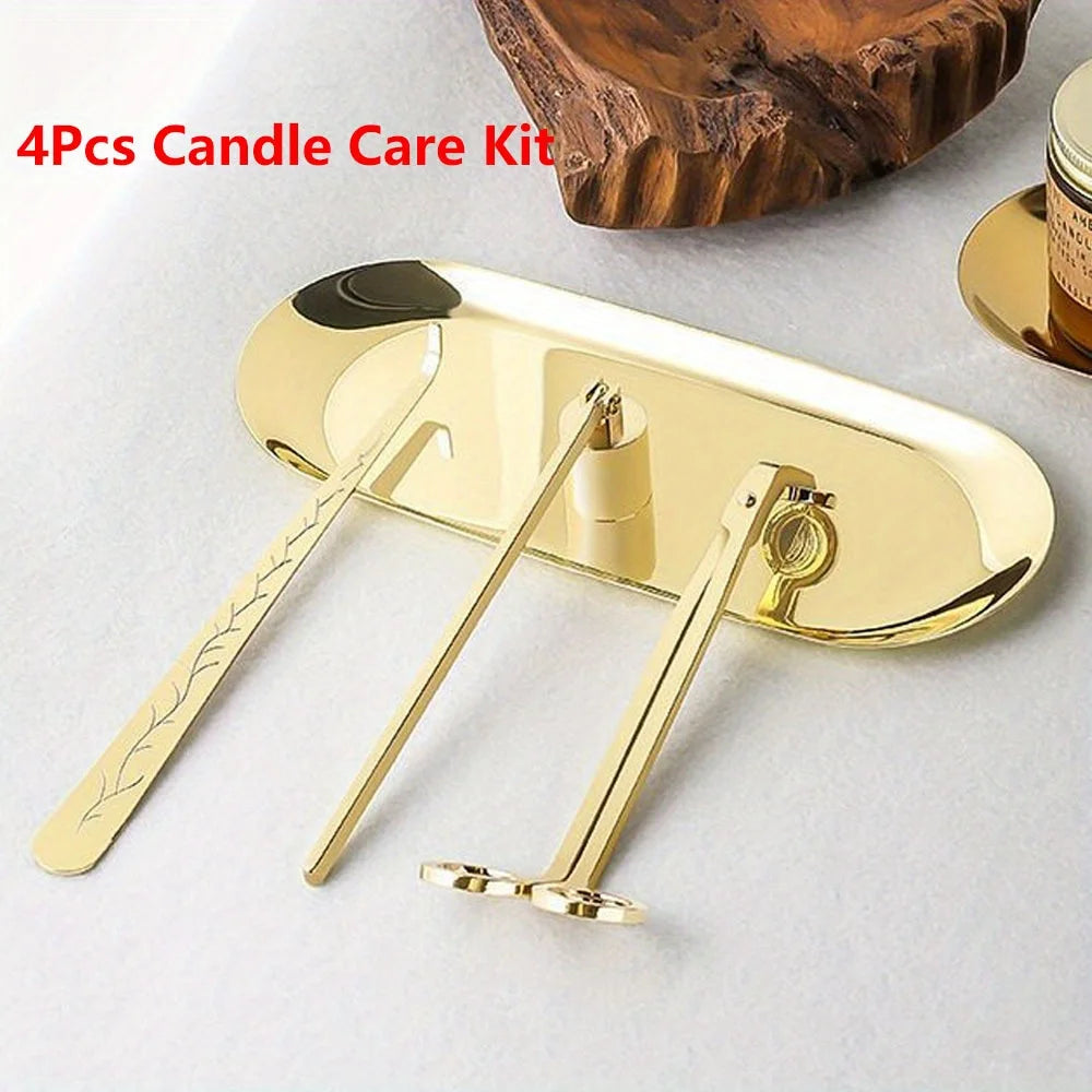 Gold-toned 4-piece candle care kit with tray, scissor, poker, and wick trimmer