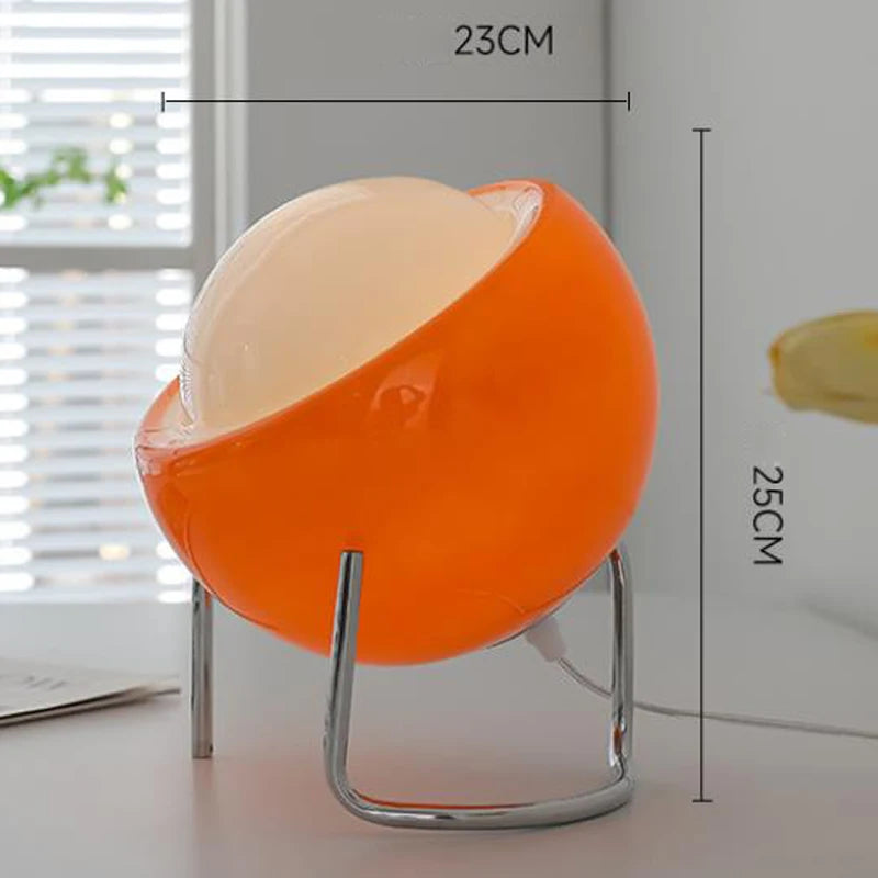 Amber glass globe table lamp, chrome base, 23cm x 25cm size shown
