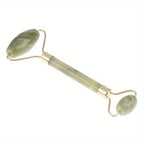 Classic Jade gua sha sculpting board with two oval stones and gold frame