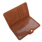 Cognac brown passport wallet open view with interior slots and button closure