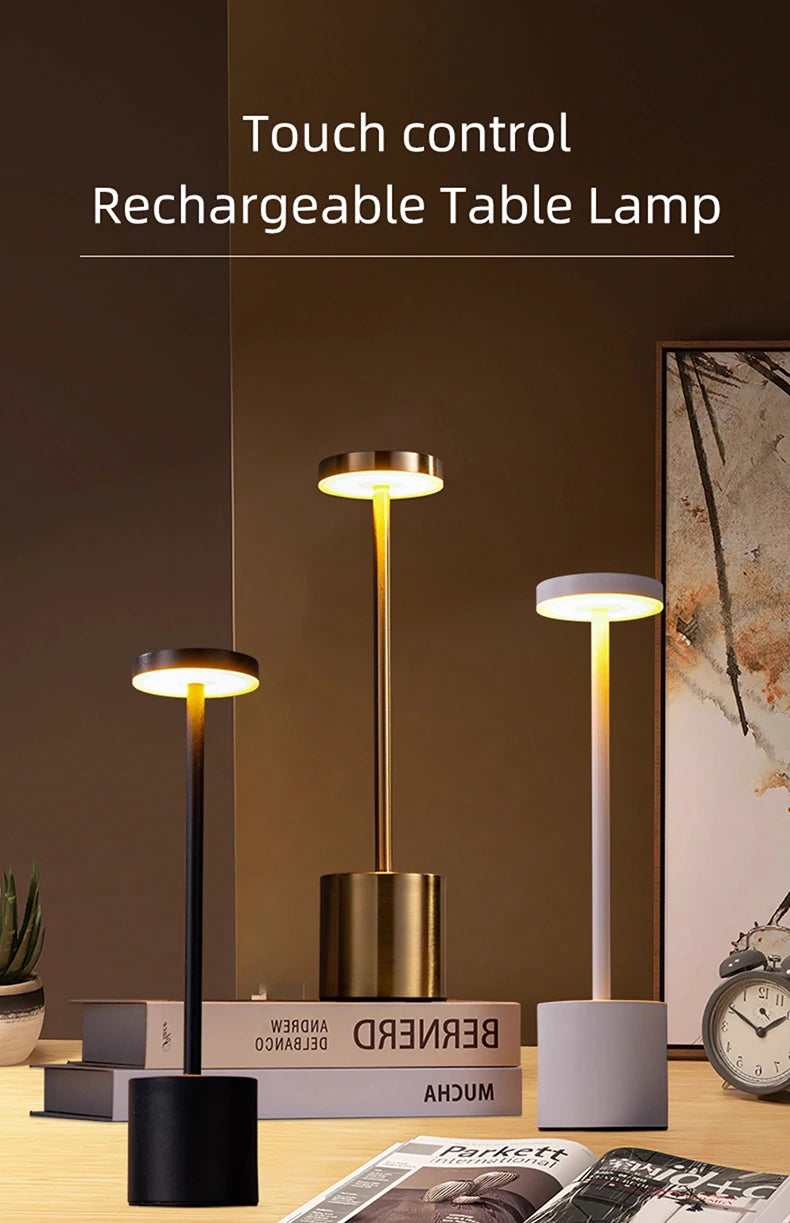 Rechargeable LED touch lamps with black, gold, and white bases, each with glowing top