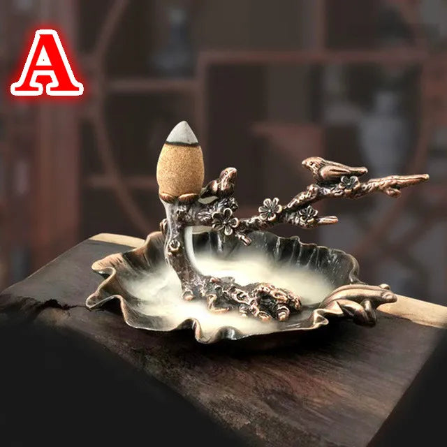 Plum branch incense stand with cone incense and smoke on ruffled leaf basin