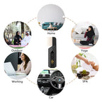 USB aromatherapy burner in matte black with comb-like vents and power icon.