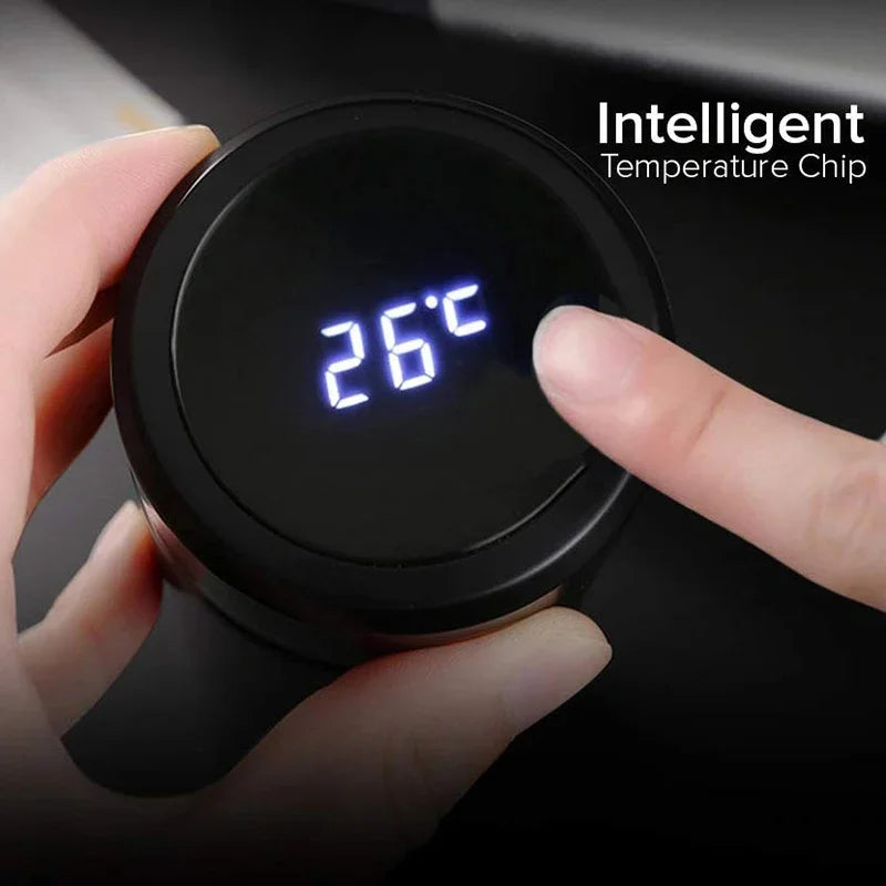 Dual-wall smart thermos LED base with temperature reading 26°F, held by hand
