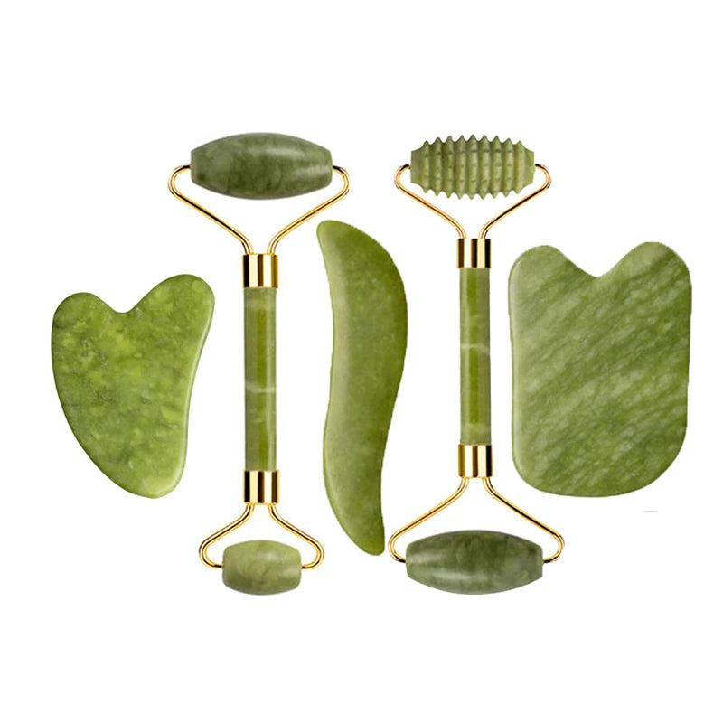 Green jade face rollers and gua sha set with gold-toned metal and carved roller heads