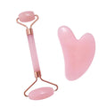 Pink jade roller: rose quartz–tone stone roller and heart-shaped gua sha tool