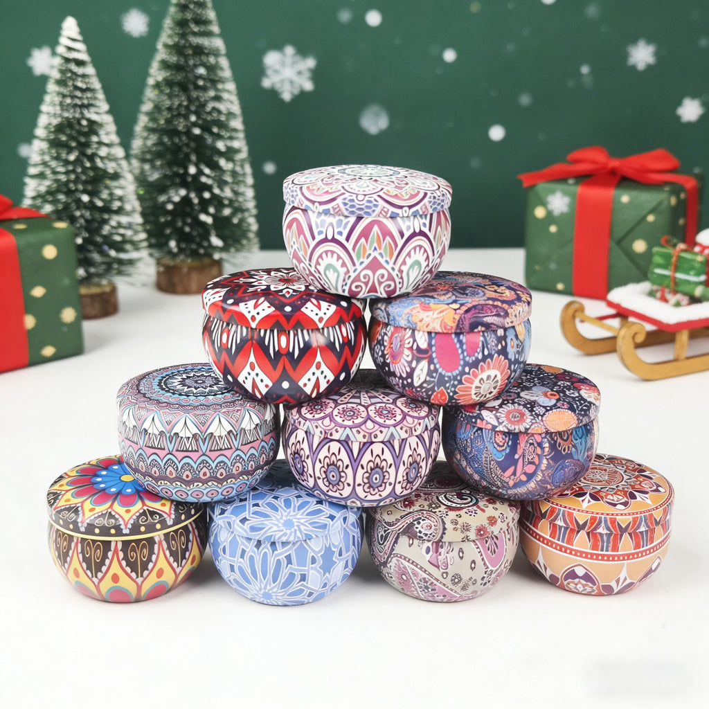 Stack of patterned tin candles with colorful mandala prints
