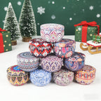 Stack of patterned tin candles with colorful mandala prints