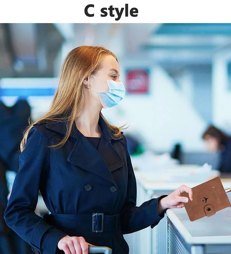 Brown passport card holder with flap closure held in hand, “C style”