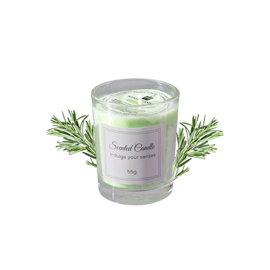 Light green glass scented candle with herb sprigs, gift-ready