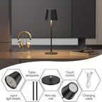 Black wireless touch table lamp on round base with bronze stem and shade