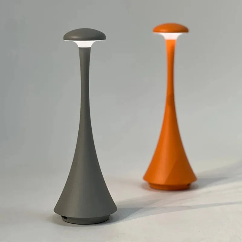 Cordless mushroom touch table lamp set: dark gray base and warm orange lamp side by side.
