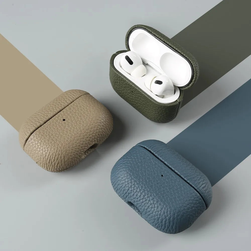 Green leather AirPods case set: closed case and open case with earbuds inside