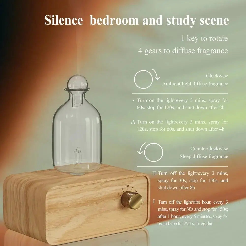 Essential oil diffuser with clear glass bottle and light wood base with brass knob