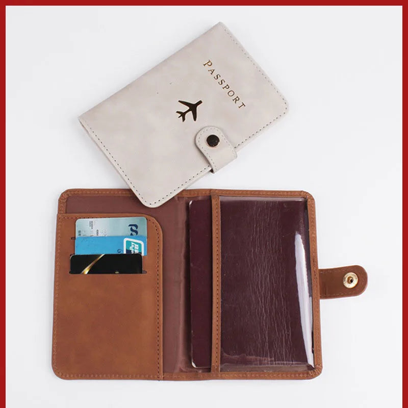 Cream/gray passport folio open view with airplane logo and inner card and passport pockets