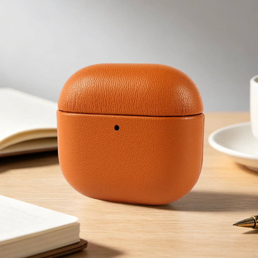 Light brown eco-leather AirPods case, rounded clamshell with small front opening