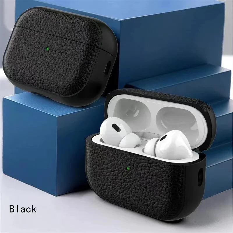 Black leather AirPods case with lid open and earbuds inside