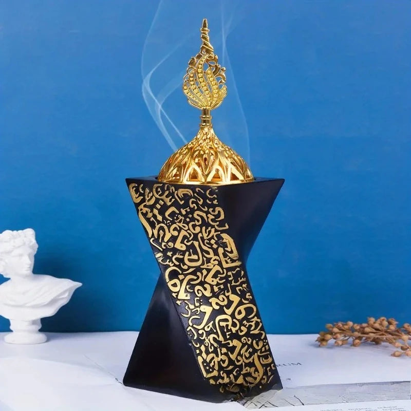 Black resin bakhoor burner with gold finial and engraved Arabic calligraphy panel