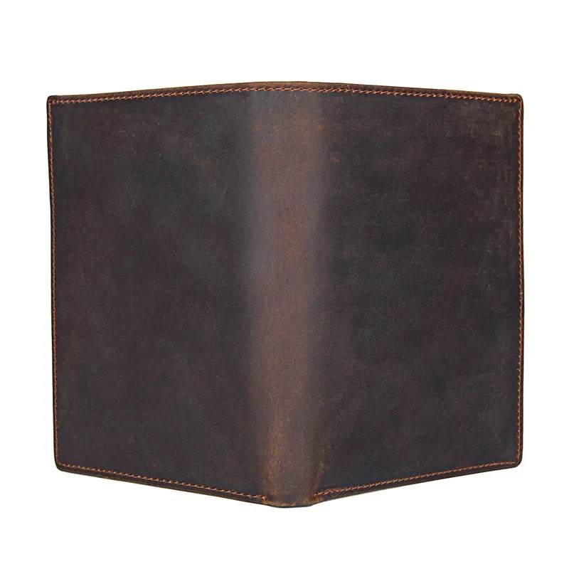 Compact travel document wallet, dark brown top view with stitched border